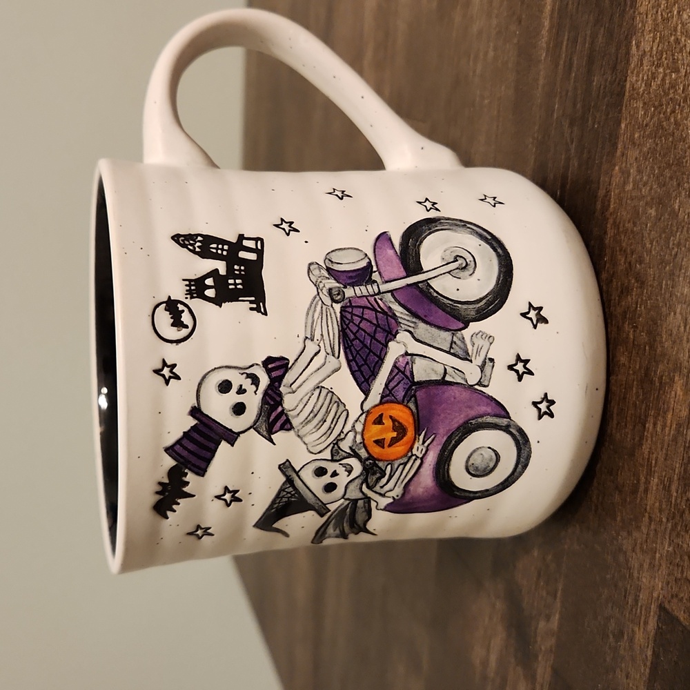Skeletons on motorcycle Halloween mug by Cobwebs and Cauldrons